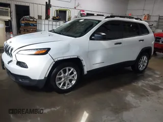 2016 Jeep Cherokee Sport z VIN 1C4PJLAB2GW291282, wystawiony jako IAAI lot #41579554 z przebiegiem 121 590 mil mil oraz . Historia ofert i sprzedaży dostępna na DreamBid. Obrazek 19.