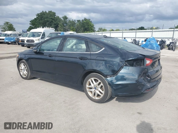 2014 Ford Fusion SE with VIN 3FA6P0HD4ER312252, listed as a Copart auction lot 52252565 with 118,967 mi miles and Salvage Title. Bid and sale history available at DreamBid. Image 2.