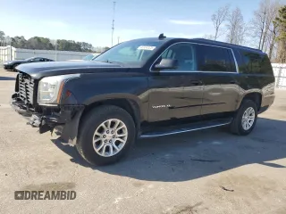 2019 GMC Yukon XL SLT with VIN 1GKS2GKCXKR297803, listed as a Copart auction lot 48304525 with 125,741 mi miles and Salvage Title. Bid and sale history available at carsss.com. Image 1.