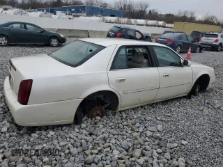 2000 Cadillac DeVille DTS z VIN 1G6KF5797YU263599, wystawiony jako Copart lot #81576484 z przebiegiem 118 414 mil mil oraz Szkoda całkowita • Salvage title. Historia ofert i sprzedaży dostępna na DreamBid. Obrazek 3.