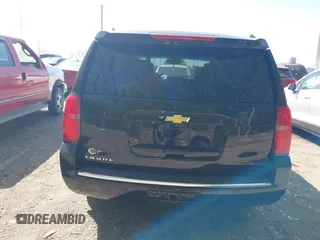 2015 Chevrolet Tahoe LTZ z VIN 1GNSKCKC8FR141163, wystawiony jako IAAI lot #42114008 z przebiegiem 221 804 mil mil oraz . Historia ofert i sprzedaży dostępna na DreamBid. Obrazek 16.