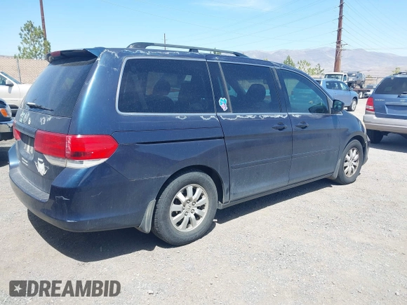 2010 Honda Odyssey EX-L with VIN 5FNRL3H73AB107662, listed as a IAAI auction lot 42107166 with 188,308 mi miles. Bid and sale history available at carsss.com. Image 4.
