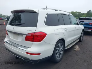 2014 Mercedes-Benz GL 450 with VIN 4JGDF7CE5EA408944, listed as a IAAI auction lot 42397384 with 182,106 mi miles and . Bid and sale history available at DreamBid. Image 4.