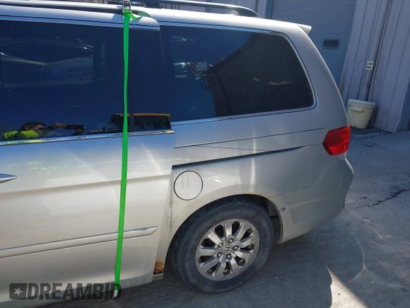2008 Honda Odyssey EX-L with VIN 5FNRL38738B098262, listed as a IAAI auction lot 42061465 with 207,825 mi miles and . Bid and sale history available at DreamBid. Image 6.