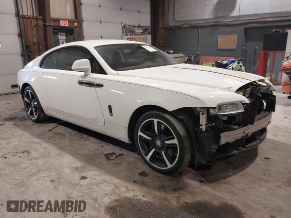 2014 Rolls-Royce Wraith z VIN SCA665C59EUX84389, wystawiony jako IAAI lot #41413368 z przebiegiem 57 951 mil mil oraz . Historia ofert i sprzedaży dostępna na DreamBid. Obrazek 1.