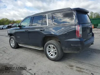 2015 GMC Yukon SLT with VIN 1GKS2BKC6FR145140, listed as a Copart auction lot 55451365 with 216,522 mi miles and Salvage Title. Bid and sale history available at DreamBid. Image 2.
