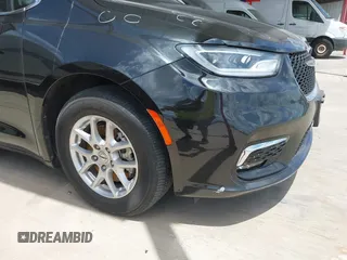 2023 Chrysler Pacifica Touring L with VIN 2C4RC1BG1PR550628, listed as a IAAI auction lot 42553430 with 61,773 mi miles and . Bid and sale history available at DreamBid. Image 20.