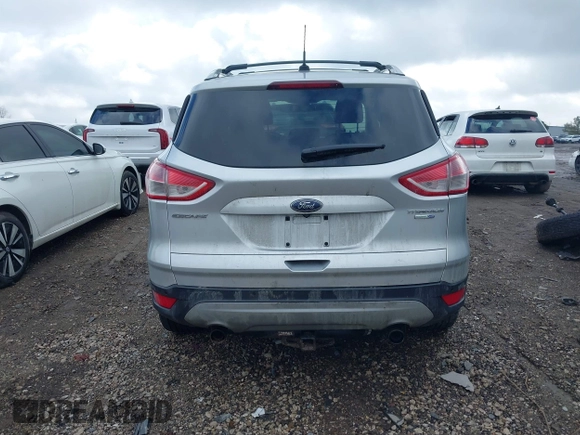 2013 Ford Escape Titanium with VIN 1FMCU9J90DUC22888, listed as a IAAI auction lot 41664550 with 185,568 mi miles and . Bid and sale history available at DreamBid. Image 16.
