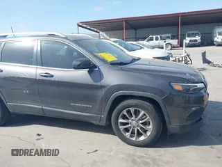 2019 Jeep Cherokee Latitude Plus with VIN 1C4PJLLB0KD382309, listed as a IAAI auction lot 41812968 with 144,368 mi miles. Bid and sale history available at carsss.com. Image 14.