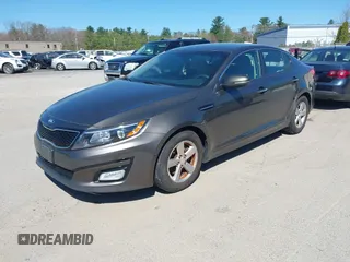 2015 Kia Optima LX with VIN 5XXGM4A74FG396236, listed as a IAAI auction lot 42165862 with 127,383 mi miles. Bid and sale history available at carsss.com. Image 2.
