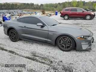 2021 Ford Mustang GT with VIN 1FA6P8CF5M5123683, listed as a Copart auction lot 50895515 with 83,245 mi miles and Salvage title. Bid and sale history available at DreamBid. Image 4.
