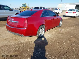 2009 Cadillac CTS AWD w/1SB with VIN 1G6DS57V390159184, listed as a IAAI auction lot 41323423 with 158,980 mi miles. Bid and sale history available at carsss.com. Image 4.