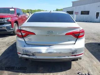 2015 Hyundai Sonata Sport with VIN 5NPE34AF6FH256579, listed as a IAAI auction lot 42052813 with 103,988 mi miles and . Bid and sale history available at DreamBid. Image 16.