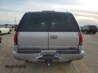 2000 GMC Denali z VIN 1GKEK63R9YR225073, wystawiony jako Copart lot #86819964 z przebiegiem 207 827 mil mil oraz Szkody całkowita. Historia ofert i sprzedaży dostępna na DreamBid. Obrazek 6.