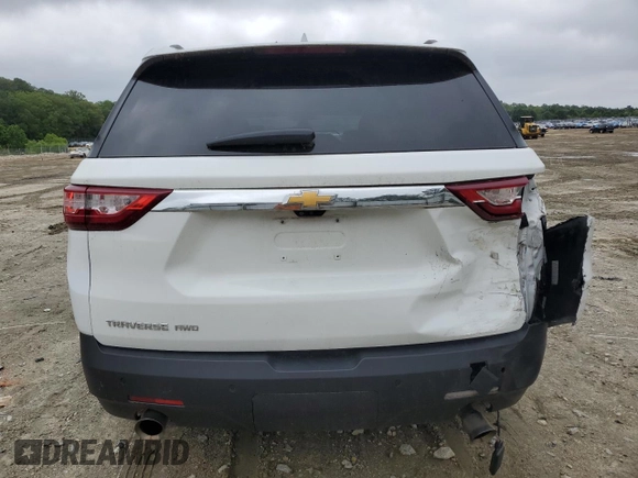 2021 Chevrolet Traverse LT with VIN 1GNEVHKWXMJ214024, listed as a Copart auction lot 56917015 with 68,829 mi miles and Salvage title. Bid and sale history available at DreamBid. Image 6.