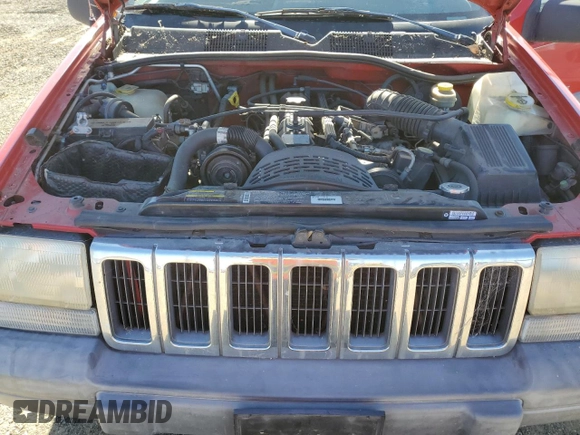 1998 Jeep Grand Cherokee Laredo with VIN 1J4GZ58S6WC370703, listed as a Copart auction lot 79691604 with 271,316 mi miles and Clean Title. Bid and sale history available at carsss.com. Image 12.