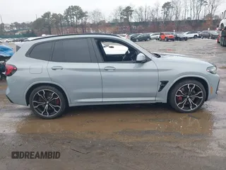 2024 BMW X3 M with VIN 5YM13EC05R9U21409, listed as a IAAI auction lot 41573382 with 11,932 mi miles. Bid and sale history available at carsss.com. Image 13.