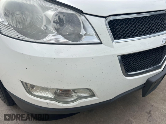 2012 Chevrolet Traverse LS z VIN 1GNKRFED2CJ394653, wystawiony jako IAAI lot #42482609 z przebiegiem 269 116 mil mil oraz . Historia ofert i sprzedaży dostępna na DreamBid. Obrazek 14.