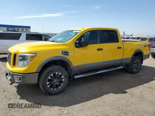 2016 Nissan Titan SL z VIN 1N6BA1F41GN510955, wystawiony jako Copart lot #54020155 z przebiegiem 135 551 mil mil oraz Czysty tytuł • Clean title. Historia ofert i sprzedaży dostępna na DreamBid. Obrazek 1.