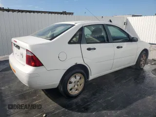 2007 Ford Focus S z VIN 1FAHP34N07W331020, wystawiony jako Copart lot #45483515 z przebiegiem 80 981 mil mil oraz Czysty tytuł • Clean title. Historia ofert i sprzedaży dostępna na DreamBid. Obrazek 3.