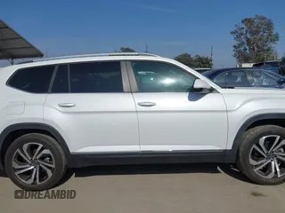 2023 Volkswagen Atlas SEL with VIN 1V2BR2CA7PC527099, listed as a IAAI auction lot 42099076 with 13,710 mi miles and . Bid and sale history available at DreamBid. Image 13.