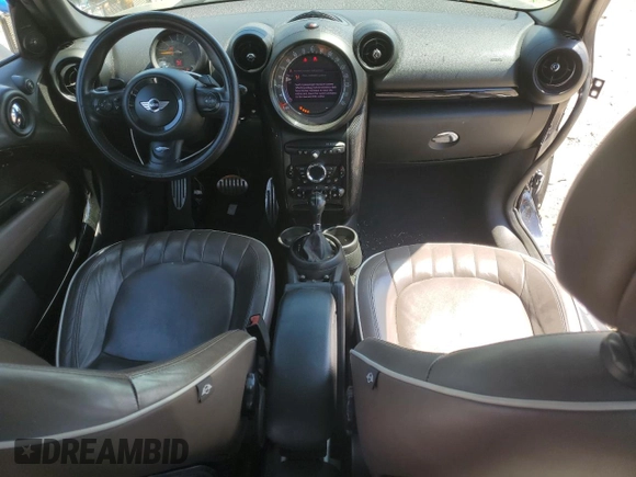 2015 MINI Countryman S with VIN WMWZC3C52FWT05882, listed as a Copart auction lot 54399525 with 125,971 mi miles and Salvage title. Bid and sale history available at DreamBid. Image 8.