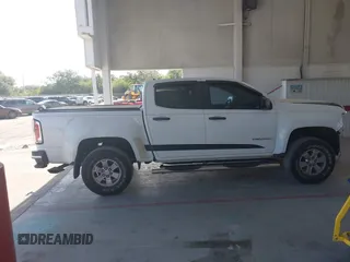 2015 GMC Canyon 2WD z VIN 1GTG5AEA8F1256722, wystawiony jako IAAI lot #42159367 z przebiegiem 140 963 mil mil oraz . Historia ofert i sprzedaży dostępna na DreamBid. Obrazek 14.