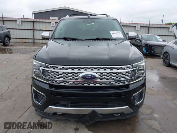 2019 Ford Expedition Platinum with VIN 1FMJU1MT8KEA02325, listed as a IAAI auction lot 41861772 with 77,124 mi miles. Bid and sale history available at carsss.com. Image 13.