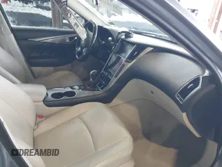 2015 Infiniti Q50 Premium with VIN JN1BV7AR4FM399046, listed as a IAAI auction lot 41560885 with 143,488 mi miles and . Bid and sale history available at DreamBid. Image 5.