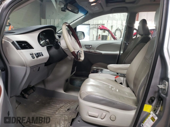 2011 Toyota Sienna XLE AAS with VIN 5TDYK3DC0BS174864, listed as a Copart auction lot 50387005 with 218,938 mi miles and Salvage Title. Bid and sale history available at DreamBid. Image 7.