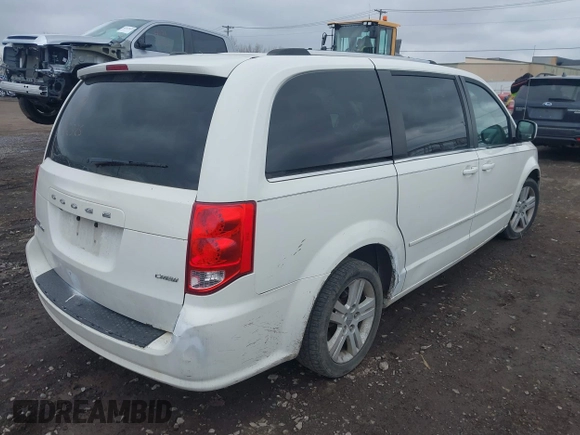 2011 Dodge Grand Caravan Crew with VIN 2D4RN5DGXBR711925, listed as a IAAI auction lot 41880154 with 156,016 mi miles and . Bid and sale history available at DreamBid. Image 4.