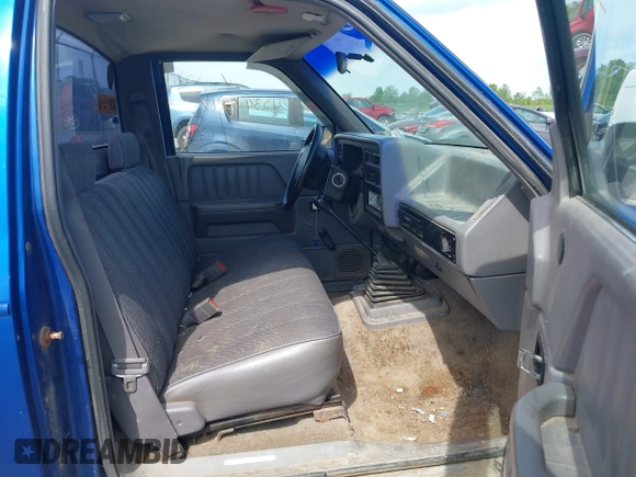 1994 Dodge Dakota z VIN 1B7GG26X5RW145863, wystawiony jako IAAI lot #42345217 z przebiegiem 117 441 mil mil oraz . Historia ofert i sprzedaży dostępna na DreamBid. Obrazek 5.