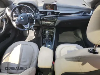 2016 BMW X1 xDrive28i with VIN WBXHT3C35G5E52949, listed as a Copart auction lot 48480215 with 100,228 mi miles and Clean Title. Bid and sale history available at carsss.com. Image 8.