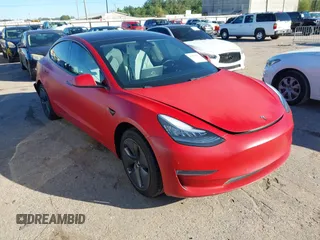 2019 Tesla Model 3 Mid Range z VIN 5YJ3E1EA9KF413156, wystawiony jako IAAI lot #40900002 z przebiegiem 107 853 mil mil oraz . Historia ofert i sprzedaży dostępna na DreamBid. Obrazek 1.