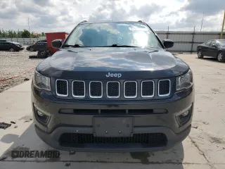 2017 Jeep Compass Latitude with VIN 3C4NJCBB0HT611440, listed as a Copart auction lot 57401485 with 128,319 mi miles and Salvage title. Bid and sale history available at DreamBid. Image 5.