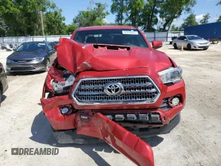 2017 Toyota Tacoma SR5 with VIN 5TFAZ5CN5HX051995, listed as a Copart auction lot 52018825 with 96,963 mi miles and Salvage Title. Bid and sale history available at DreamBid. Image 5.