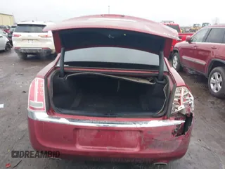 2013 Chrysler 300 C with VIN 2C3CCAEG4DH698893, listed as a IAAI auction lot 41189845 with 153,638 mi miles and . Bid and sale history available at DreamBid. Image 16.