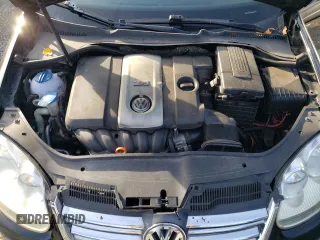 2009 Volkswagen Jetta z VIN 3VWTZ71K99M252459, wystawiony jako Copart lot #77893704 z przebiegiem 181 022 mil mil oraz Szkoda całkowita • Salvage title. Historia ofert i sprzedaży dostępna na DreamBid. Obrazek 12.