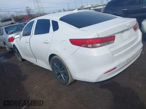 2016 Kia Optima EX with VIN 5XXGU4L39GG041624, listed as a IAAI auction lot 41653133 with 130,312 mi miles. Bid and sale history available at carsss.com. Image 3.