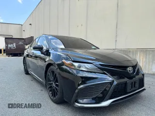 2022 Toyota Camry XSE z VIN 4T1K61AK4NU011978, wystawiony jako Copart lot #60147995 z przebiegiem 131 937 mil mil oraz Czysty tytuł • Clean title. Historia ofert i sprzedaży dostępna na DreamBid. Obrazek 1.
