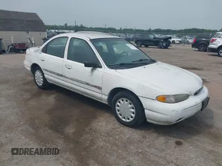 1997 Ford Contour z VIN 3FALP653XVM101281, wystawiony jako IAAI lot #42496912 z przebiegiem 81 888 mil mil oraz . Historia ofert i sprzedaży dostępna na DreamBid. Obrazek 1.