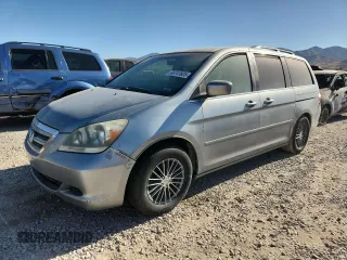 2007 Honda Odyssey EX with VIN 5FNRL38447B119771, listed as a Copart auction lot 66741825 with 216,480 mi miles and Clean title. Bid and sale history available at DreamBid. Image 1.