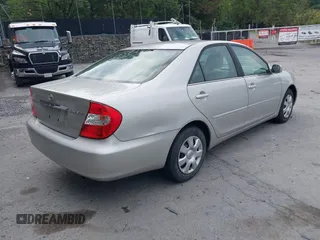 2004 Toyota Camry LE with VIN 4T1BE32K14U857478, listed as a IAAI auction lot 42654878 with 210,542 mi miles and . Bid and sale history available at DreamBid. Image 4.