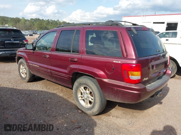 1999 Jeep Grand Cherokee Limited with VIN 1J4GW68N8XC595697, listed as a IAAI auction lot 41917466 with 177,944 mi miles. Bid and sale history available at carsss.com. Image 3.