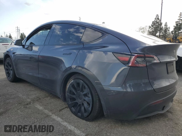 2021 Tesla Model Y Long Range with VIN 5YJYGDEE6MF200883, listed as a Copart auction lot 51707405 with 59,820 mi miles and Salvage Title. Bid and sale history available at DreamBid. Image 2.