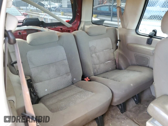 2003 Ford Explorer Sport XLS z VIN 1FMZU70E93UC11352, wystawiony jako Copart lot #84494984 z przebiegiem 188 874 mil mil oraz Szkoda całkowita • Salvage title. Historia ofert i sprzedaży dostępna na DreamBid. Obrazek 10.