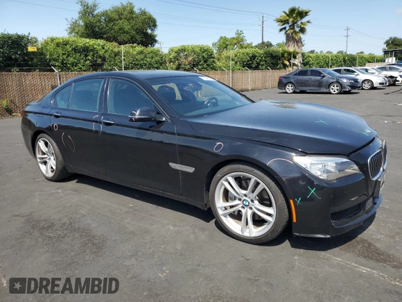 2013 BMW 7 Series 740i with VIN WBAYA6C58DC994974, listed as a Copart auction lot 55534645 with 106,975 mi miles and Salvage title. Bid and sale history available at DreamBid. Image 4.