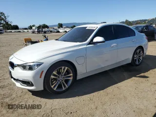 2018 BMW 3 Series 330e with VIN WBA8E1C52JA758481, listed as a Copart auction lot 58838535 with 59,143 mi miles and Salvage title. Bid and sale history available at DreamBid. Image 1.