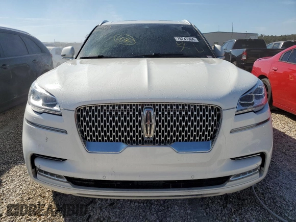 2021 Lincoln Aviator Reserve z VIN 5LM5J7WCXMGL18310, wystawiony jako Copart lot #76247904 z przebiegiem 69 111 mil mil oraz Nie do naprawy • Non repairable. Historia ofert i sprzedaży dostępna na DreamBid. Obrazek 5.
