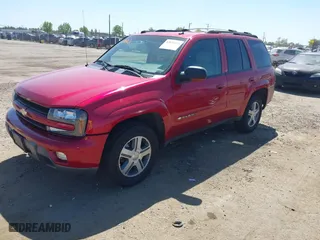 2004 Chevrolet TrailBlazer LT with VIN 1GNDS13S842376090, listed as a IAAI auction lot 42075638 with 112,519 mi miles. Bid and sale history available at carsss.com. Image 2.